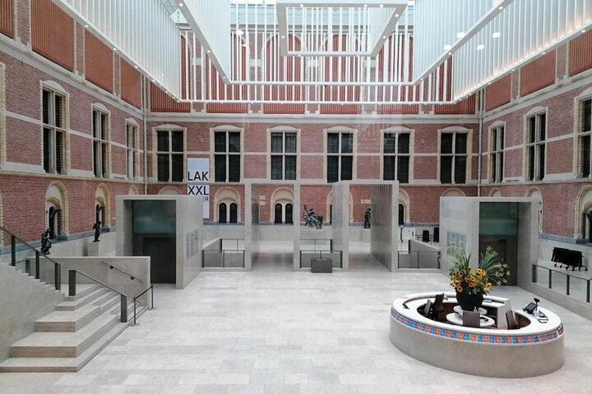 a large room with a fountain in the middle of a building