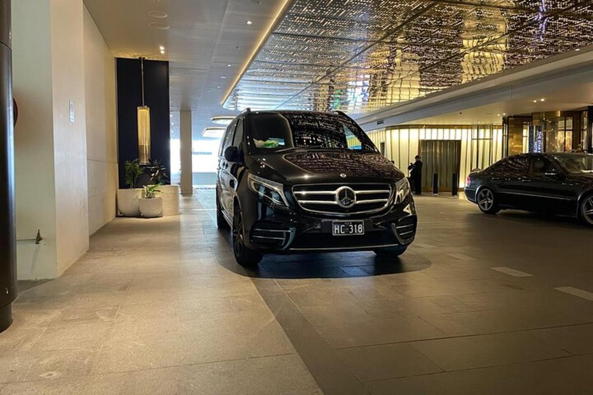 a black suv parked in a building