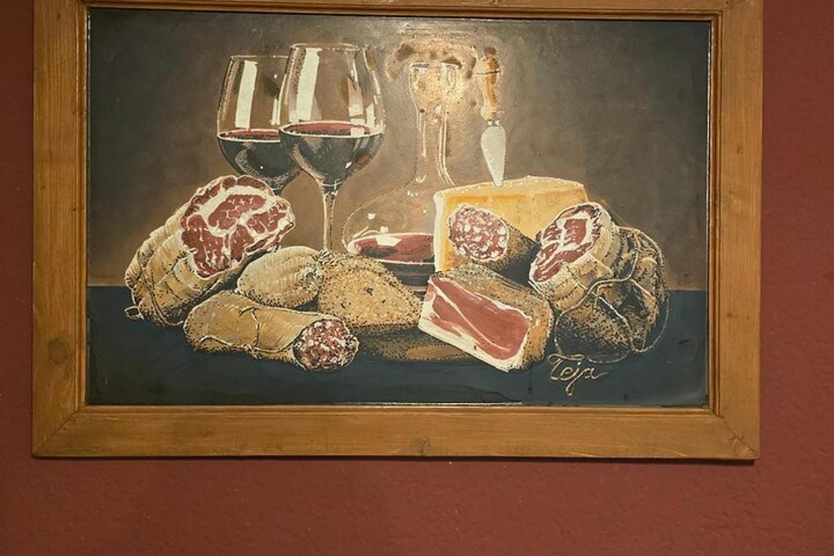 et bilde av et maleri av vinglass og brød