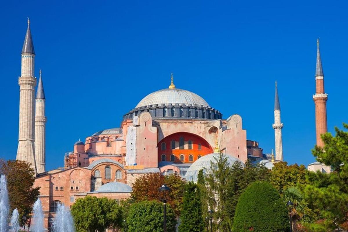 a large building with two mosques and a fountain