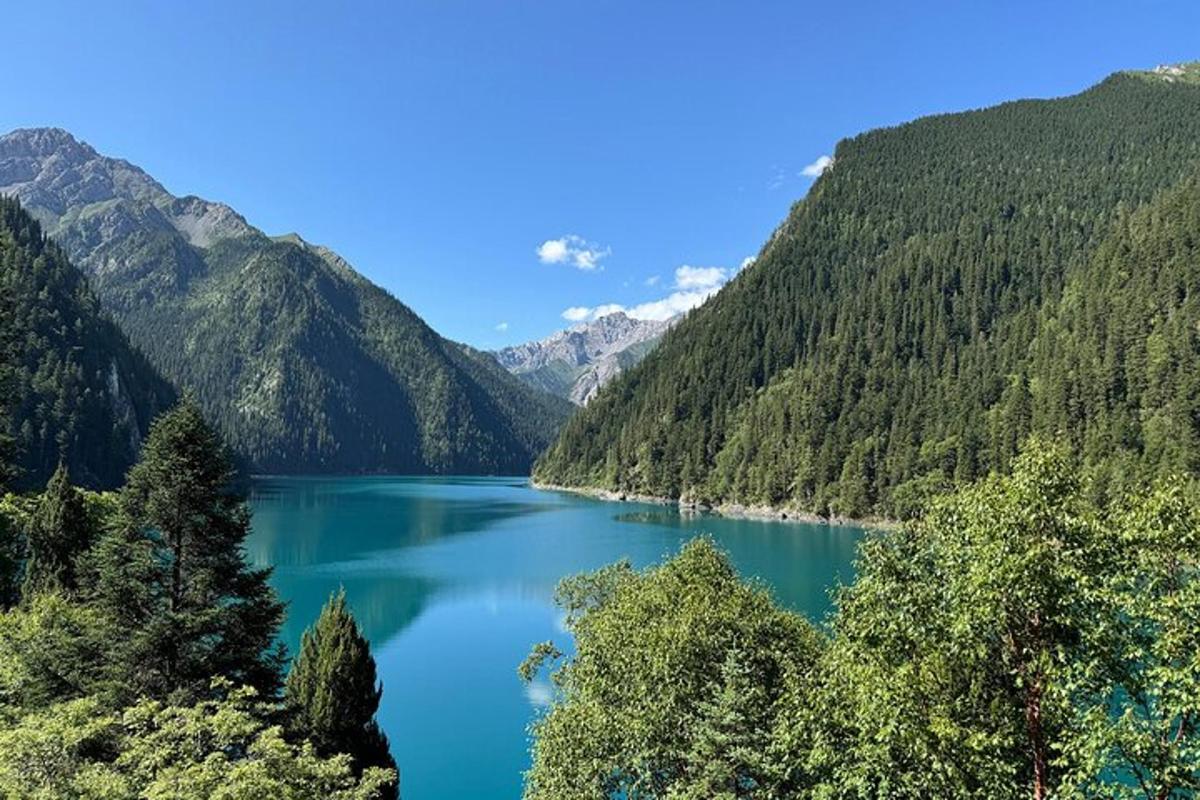 a view of a lake in the mountains