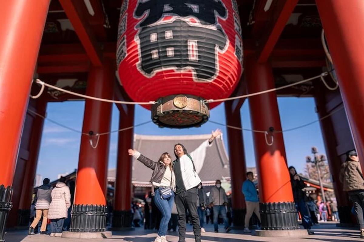 two people are standing under a hot air balloon