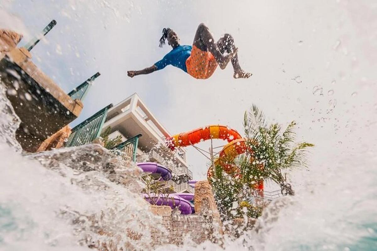 a person doing a trick on a water slide
