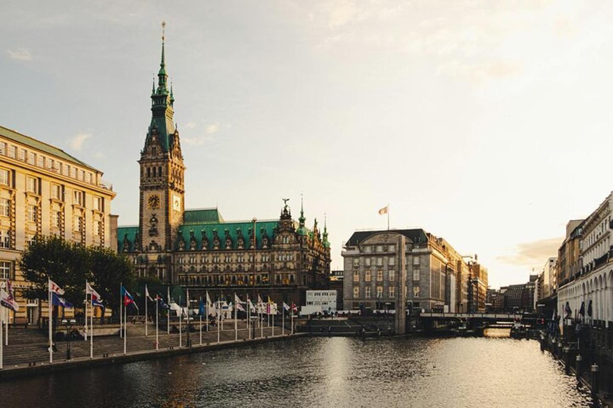 a city with a clock tower and a river