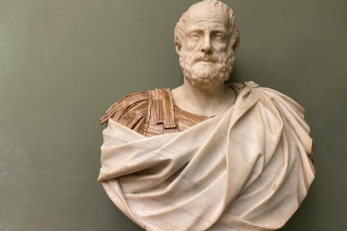 a statue of a man wrapped in a blanket
