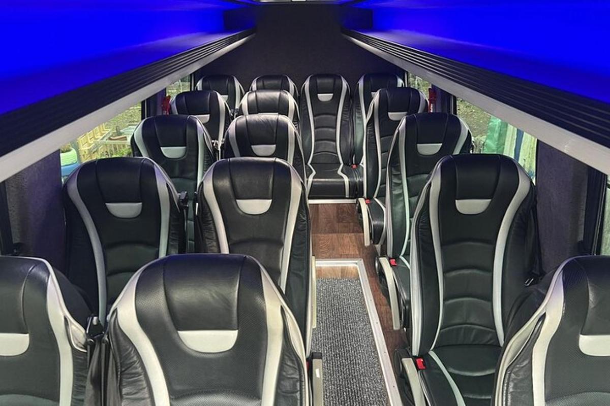 an empty bus with empty seats on a bus