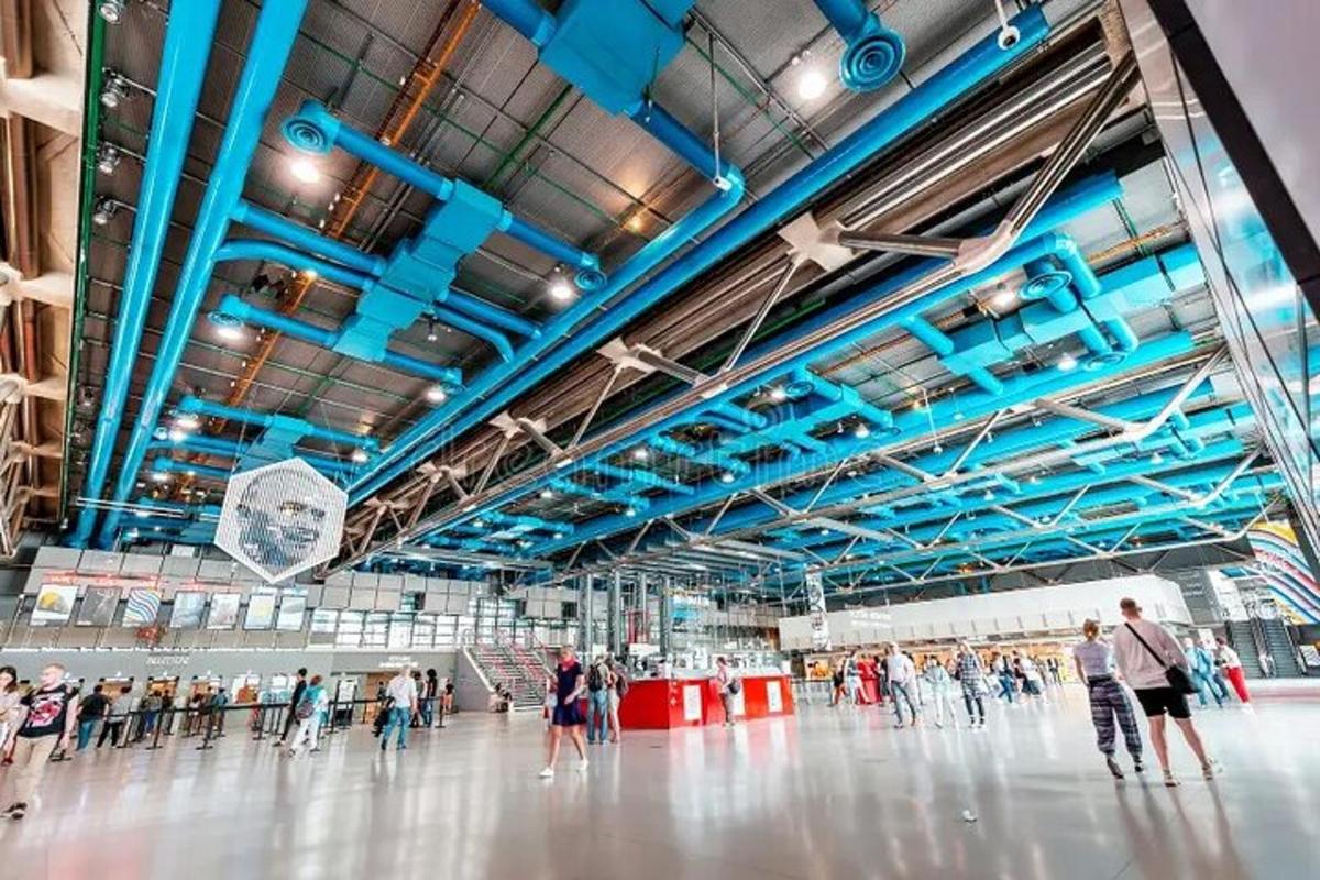 a group of people standing in a skating arena