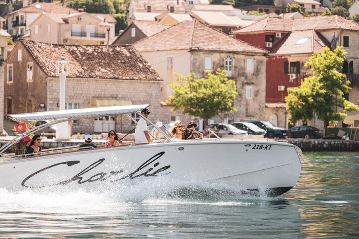 a group of people on a boat in the water