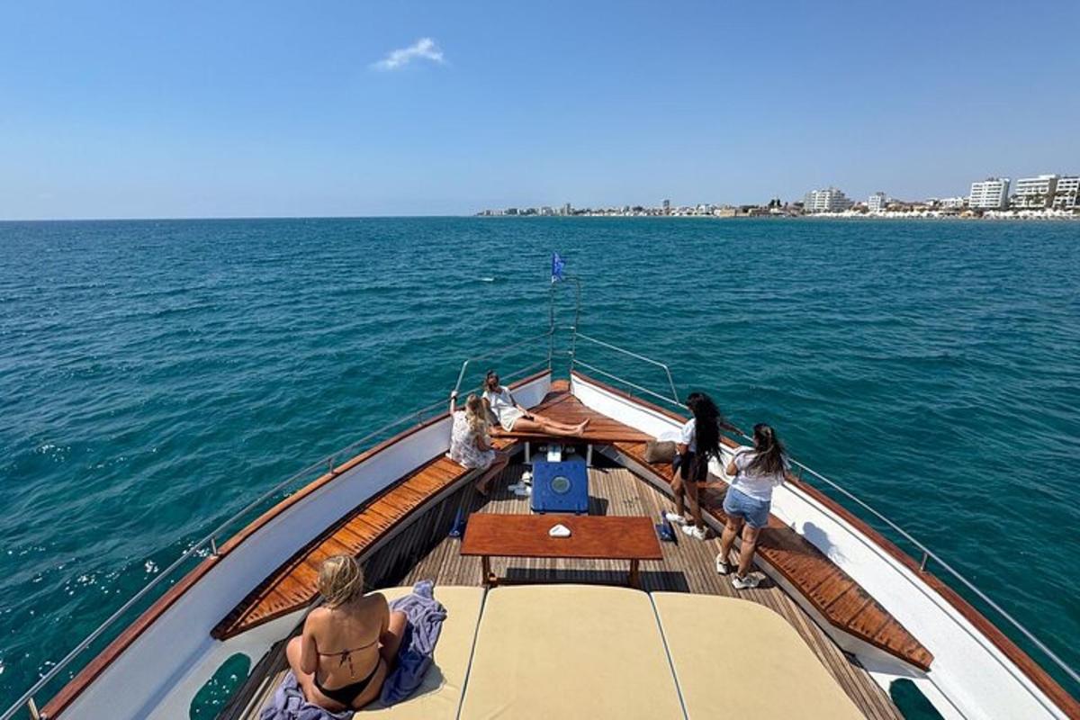 a group of people on a boat in the water