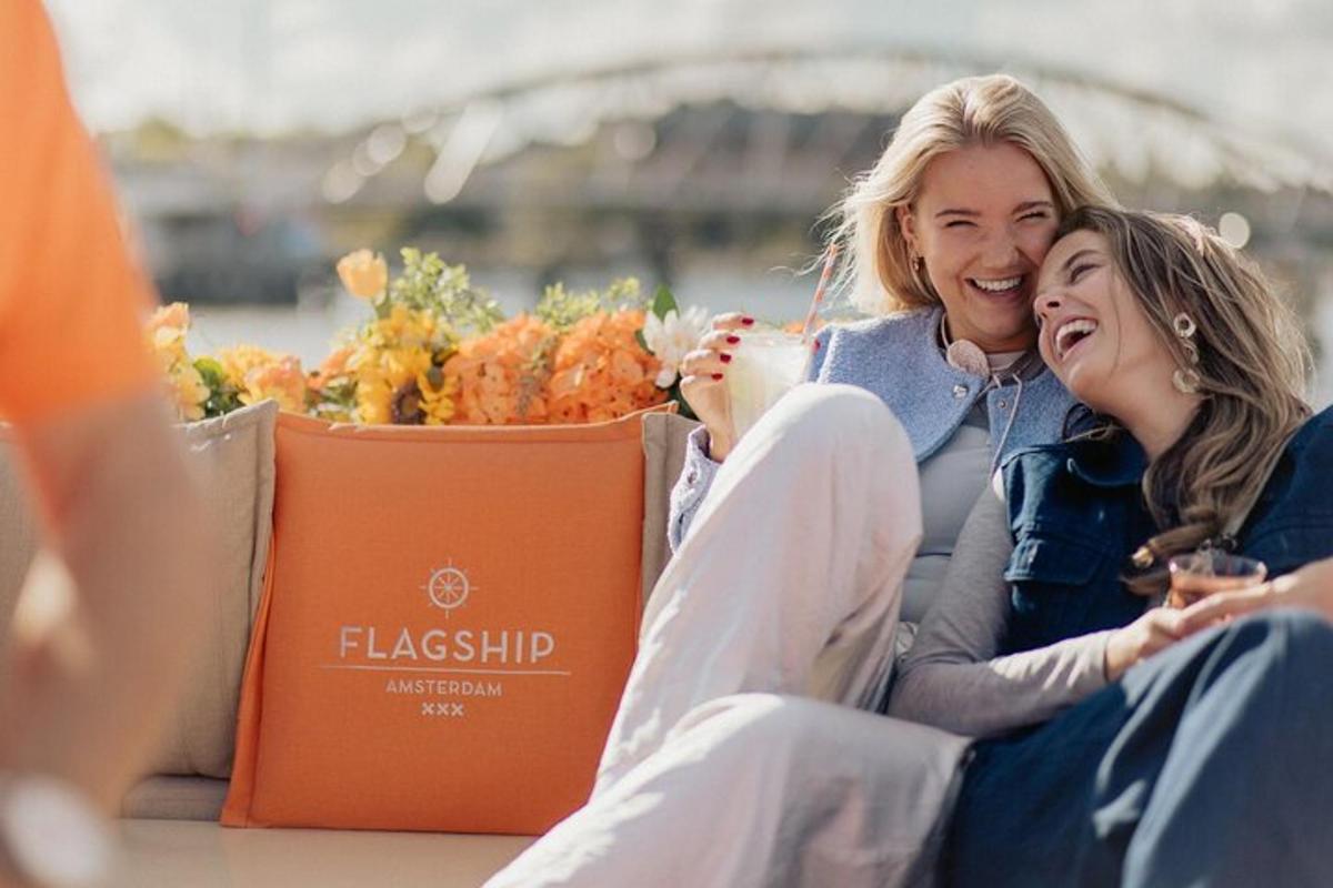 a woman and a girl are sitting on a couch
