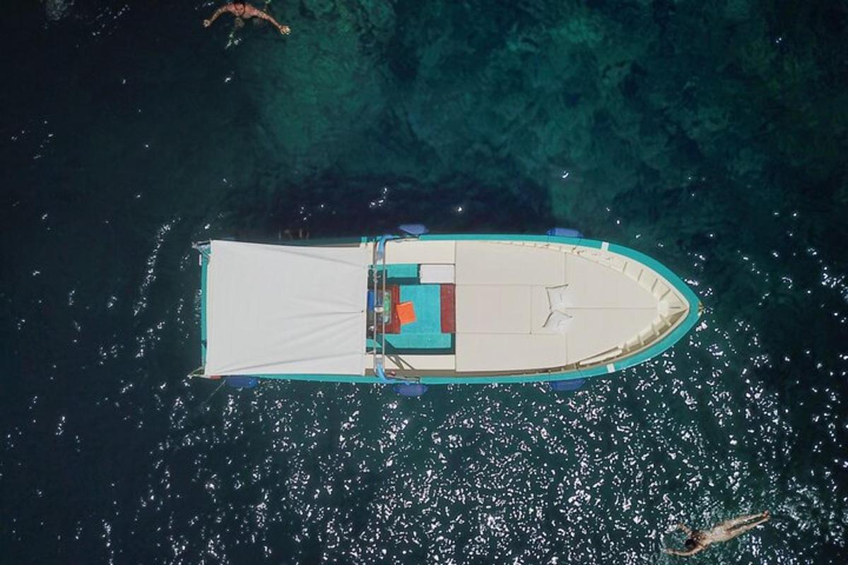 an overhead view of a boat in the water
