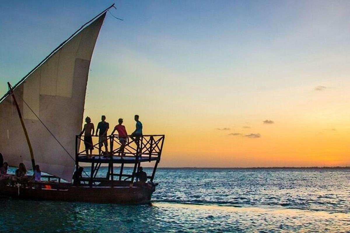 a group of people on a boat in the ocean