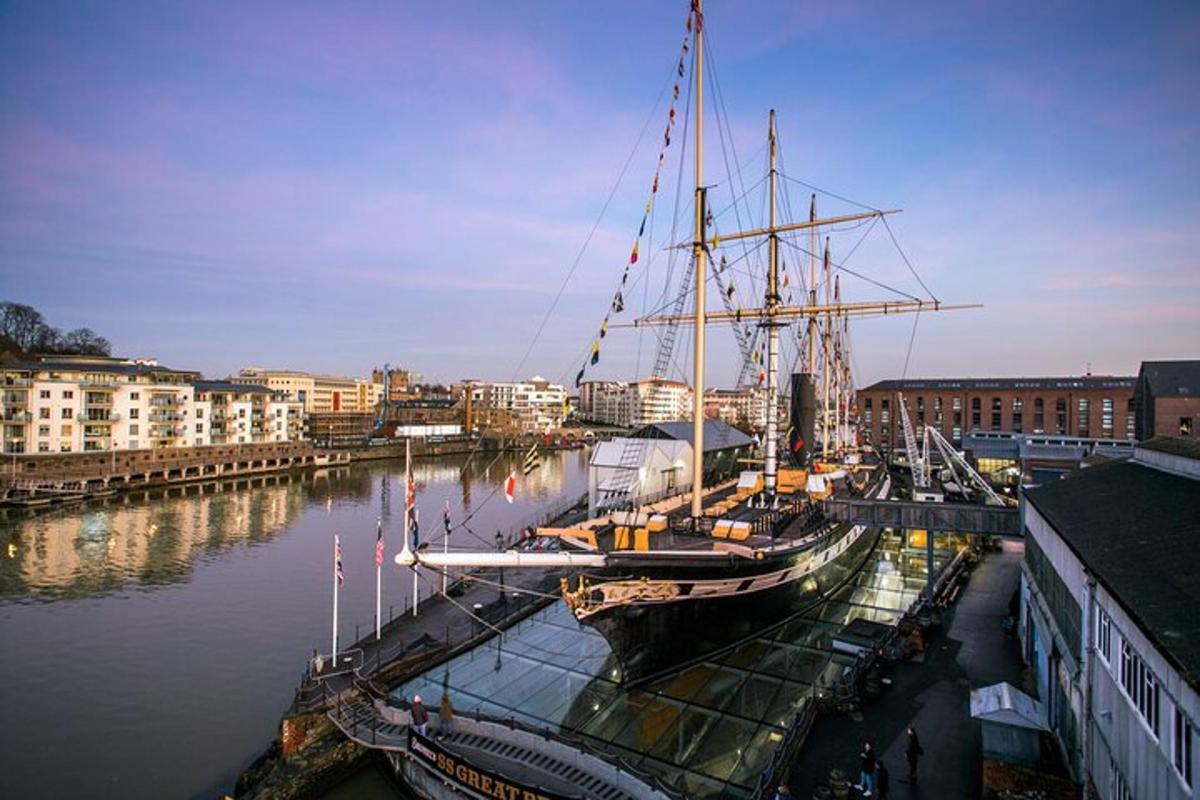 a large boat is docked in a harbor