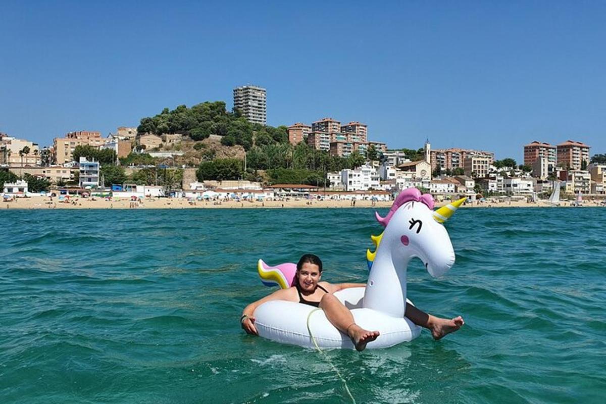 a man is riding on an inflatable horse in the water