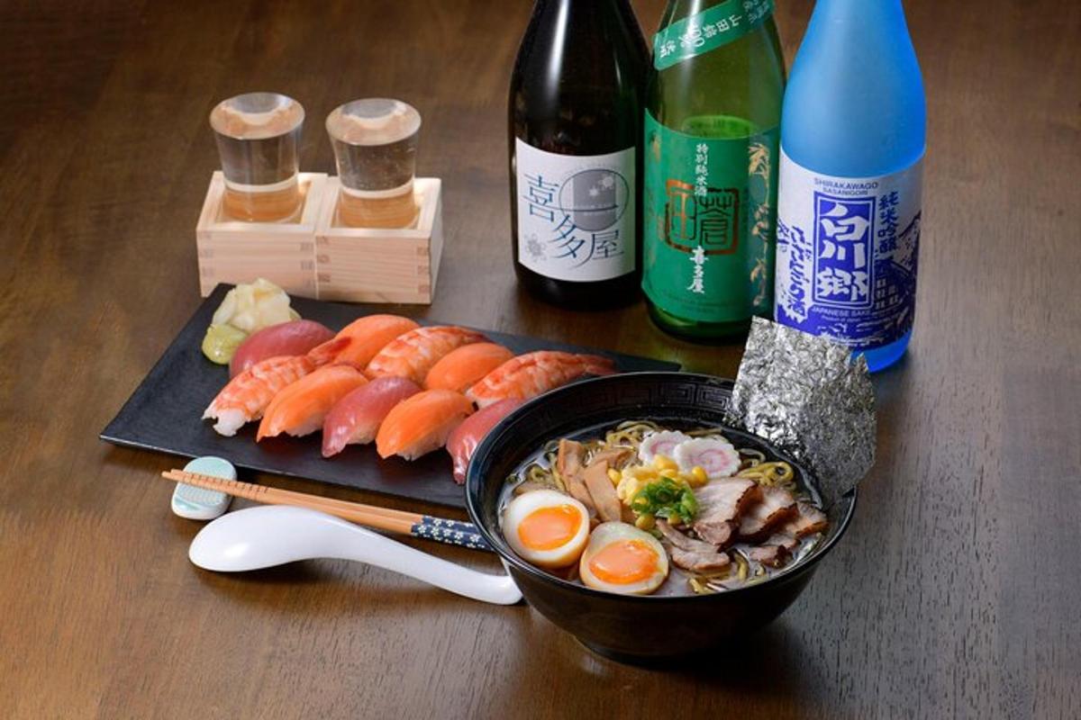 isang mangkok ng pagkain na may mga itlog at sushi at mga bote ng alak