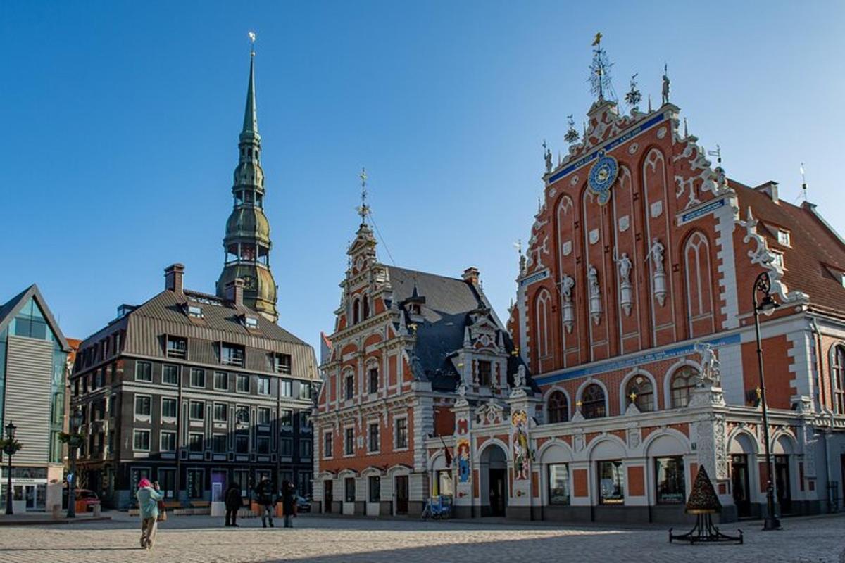 a group of buildings in a city with a clock tower