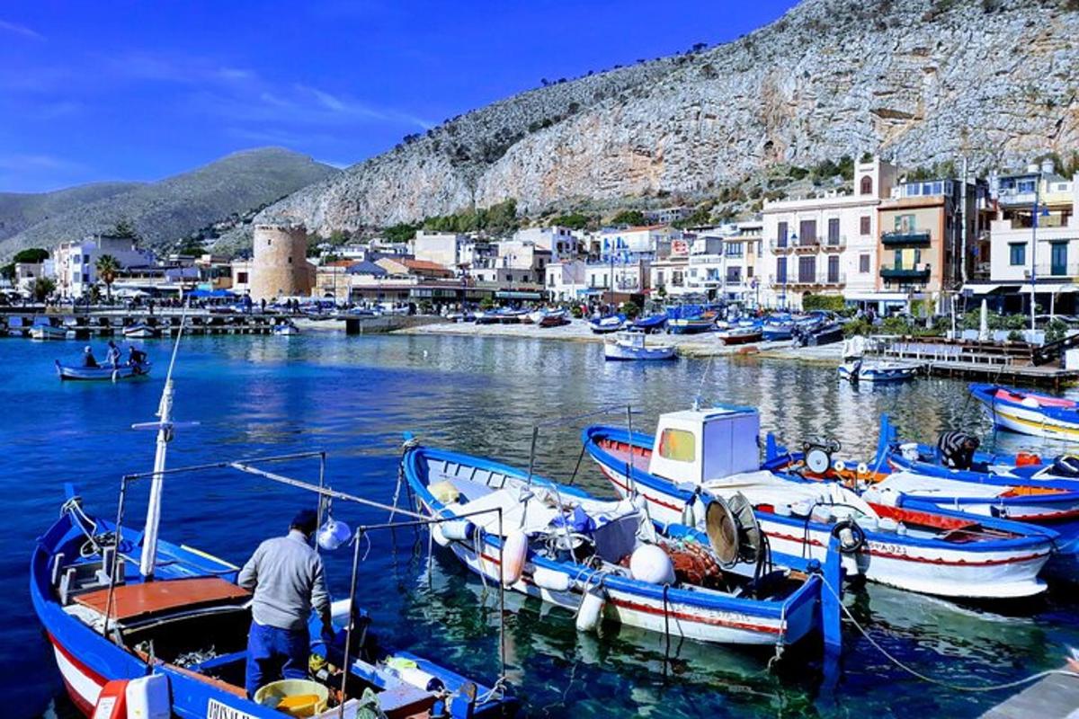 a group of boats are docked in a harbor