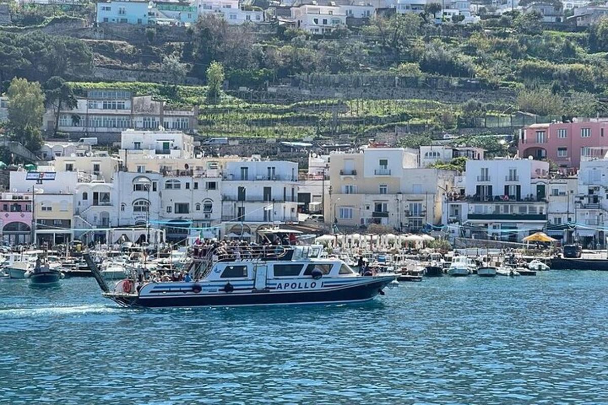 a boat in a body of water with buildings