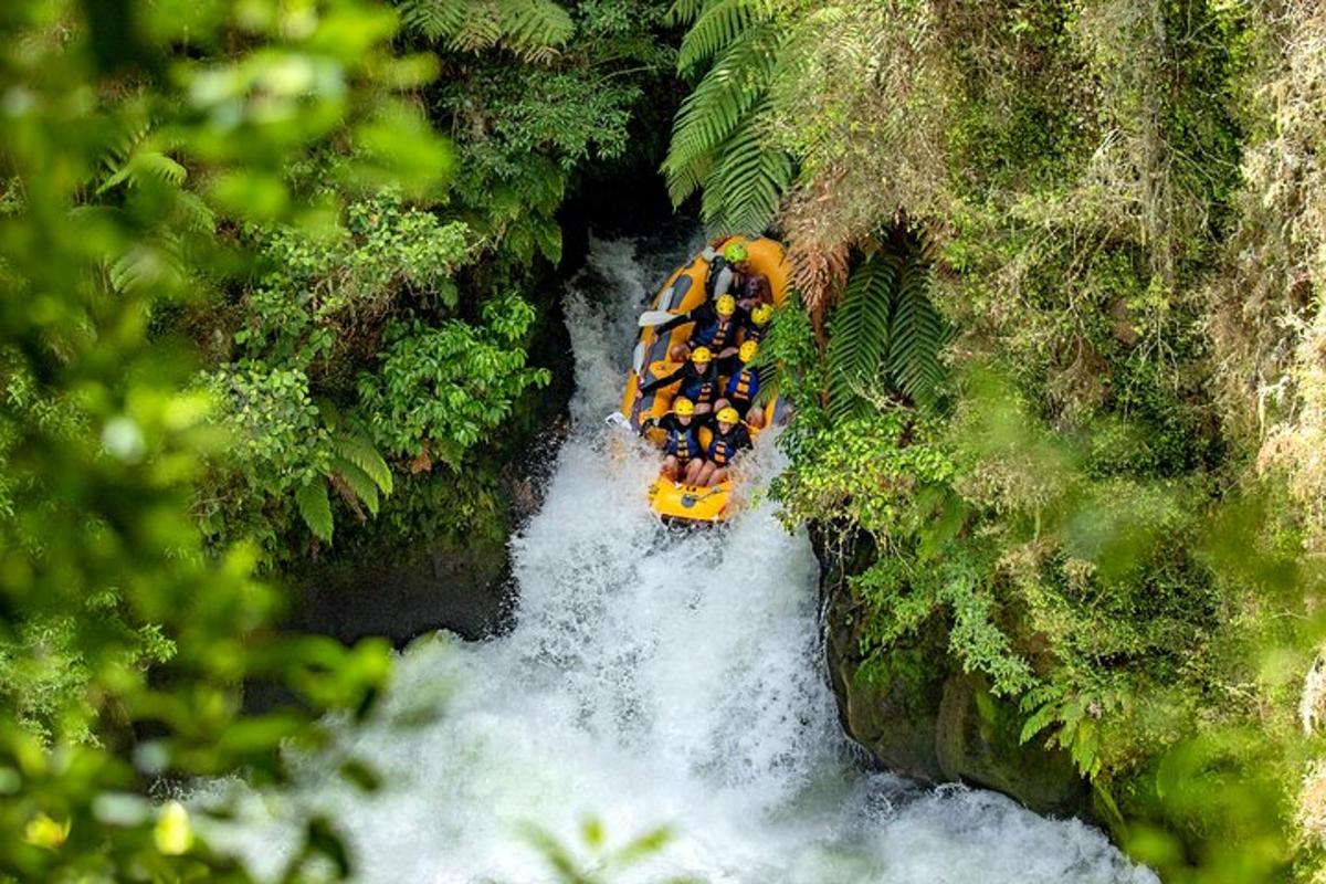 a group of people on a raft in a river