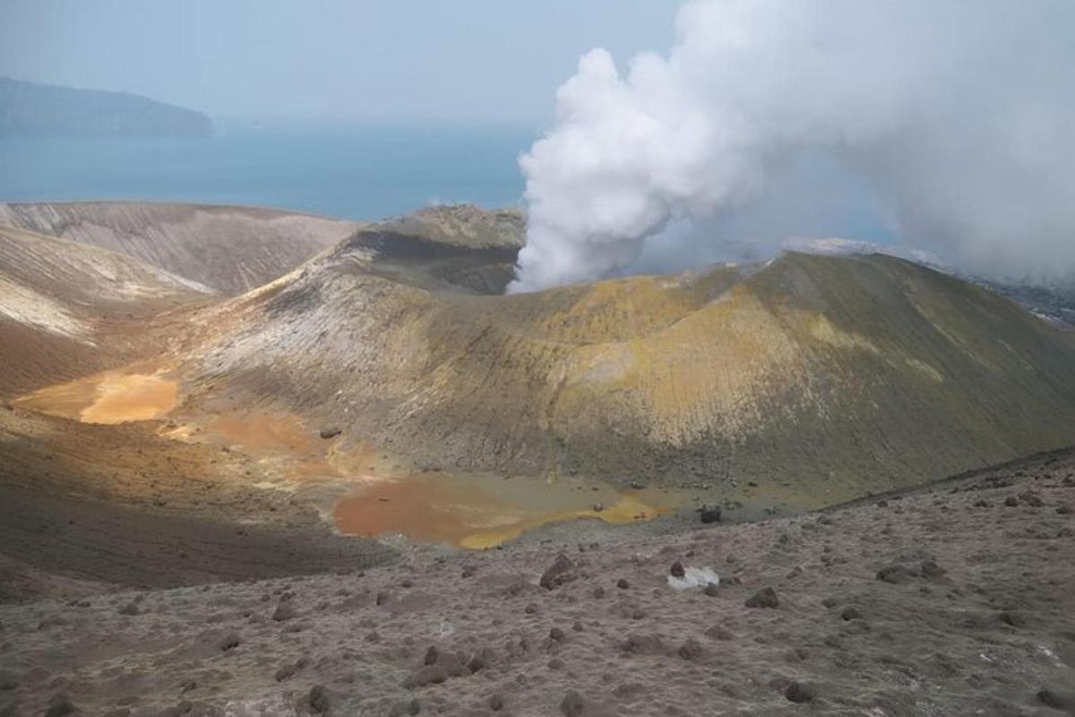 a mountain with smoke coming out of it