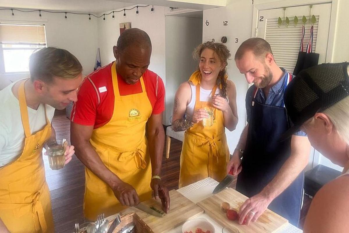 a group of people in a kitchen preparing food