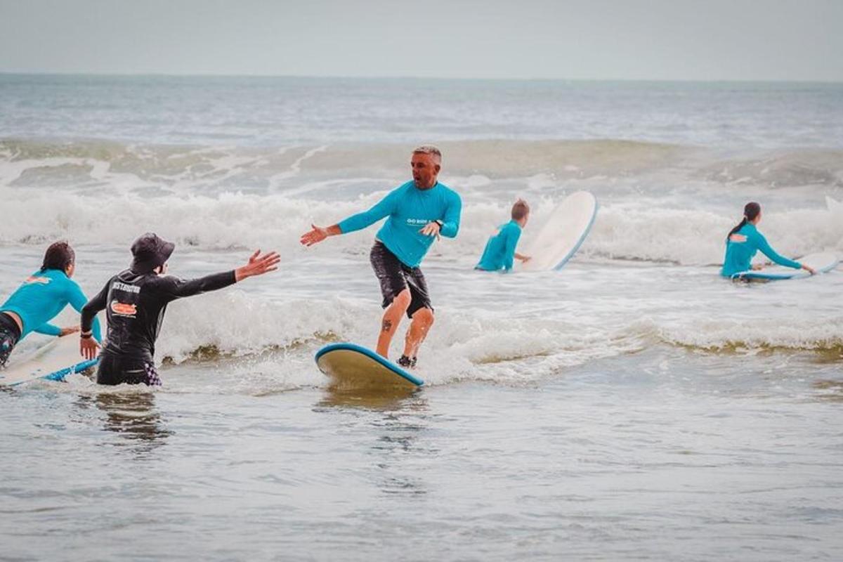 a man riding a wave on a surfboard in the ocean