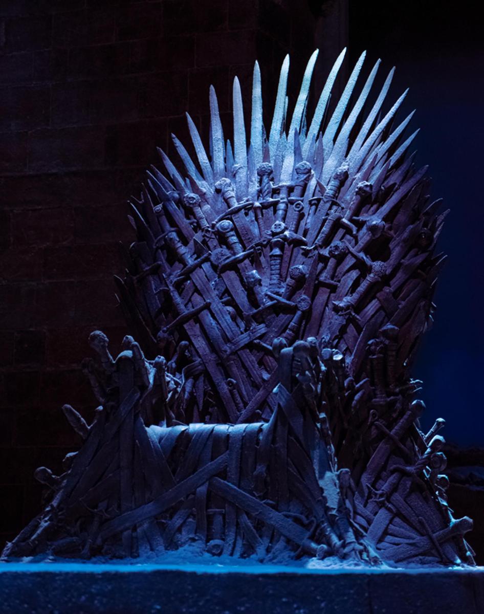 a statue of the iron throne on a stage