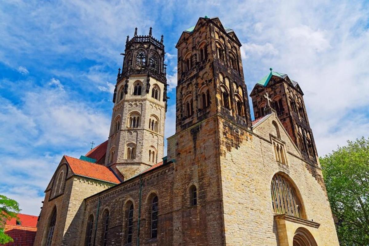 an old church with two towers on top of it