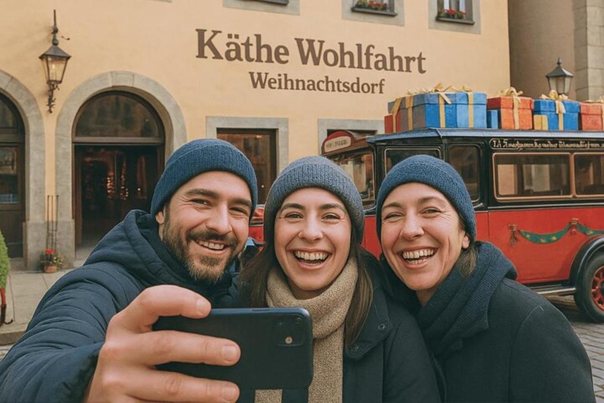 drei Personen, die mit einem Mobiltelefon ein Foto machen