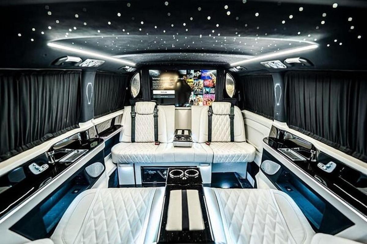 a room with two seats in a limousine