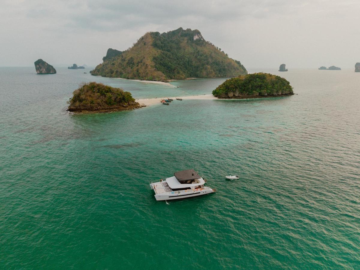 an island with a boat in the water