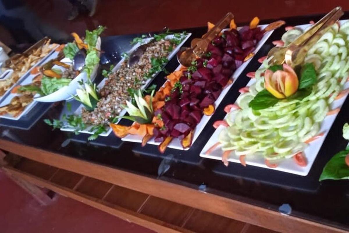 a table topped with lots of different types of food