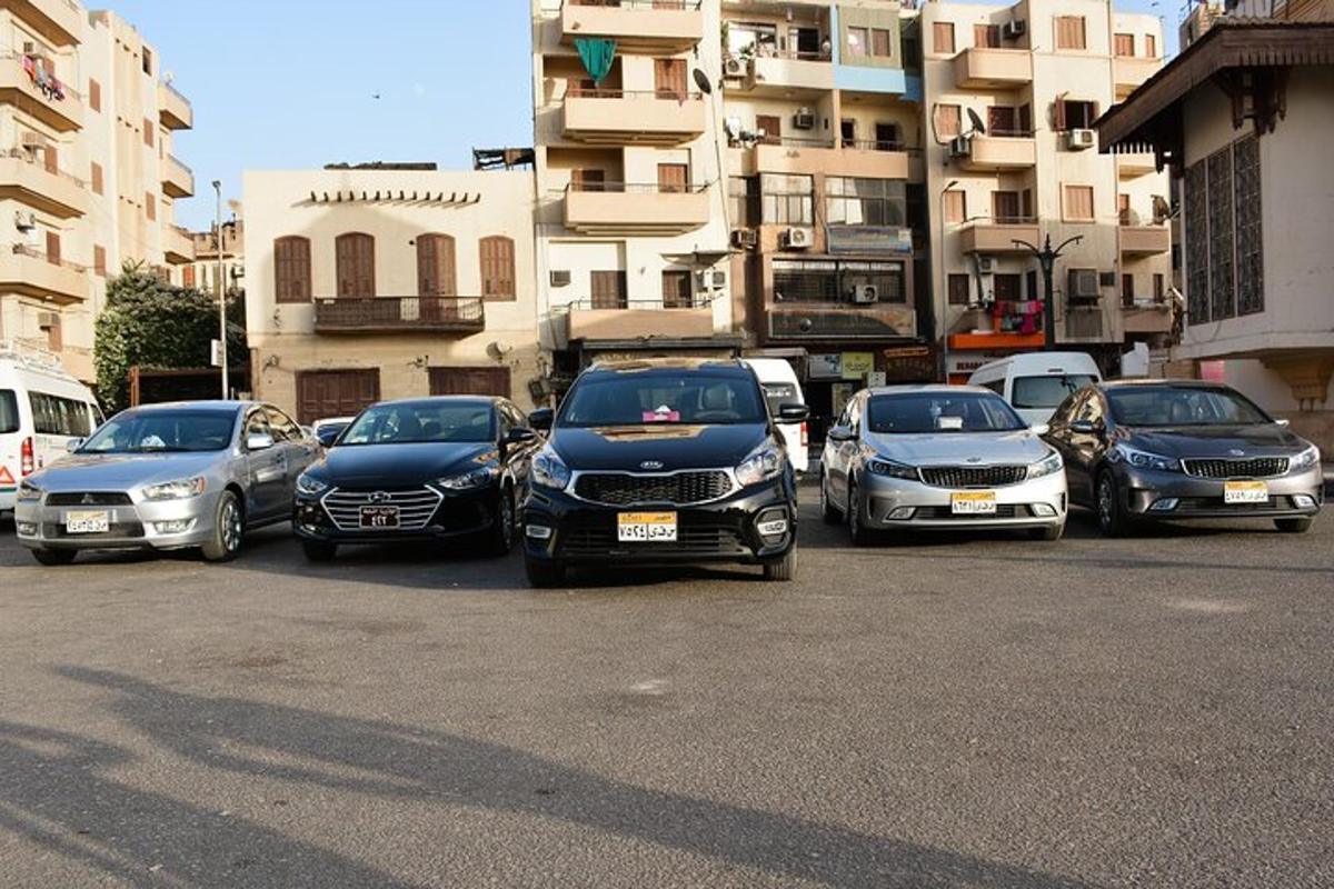 a group of cars parked in a parking lot