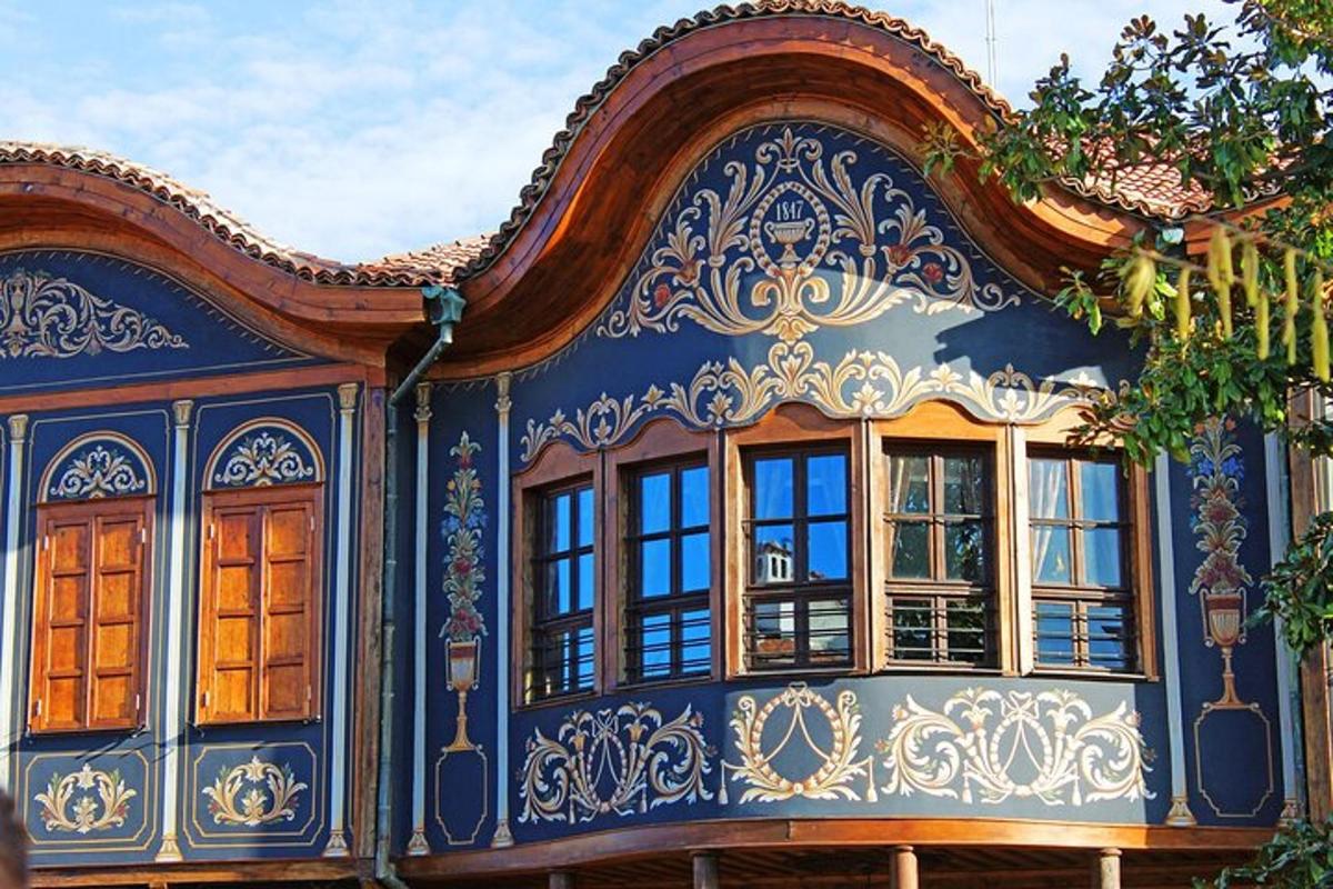 a blue and white building with windows on it