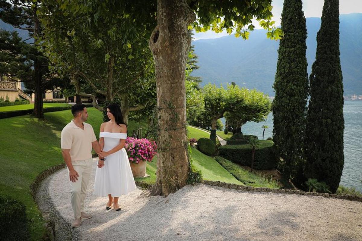 a man and a woman standing next to a tree