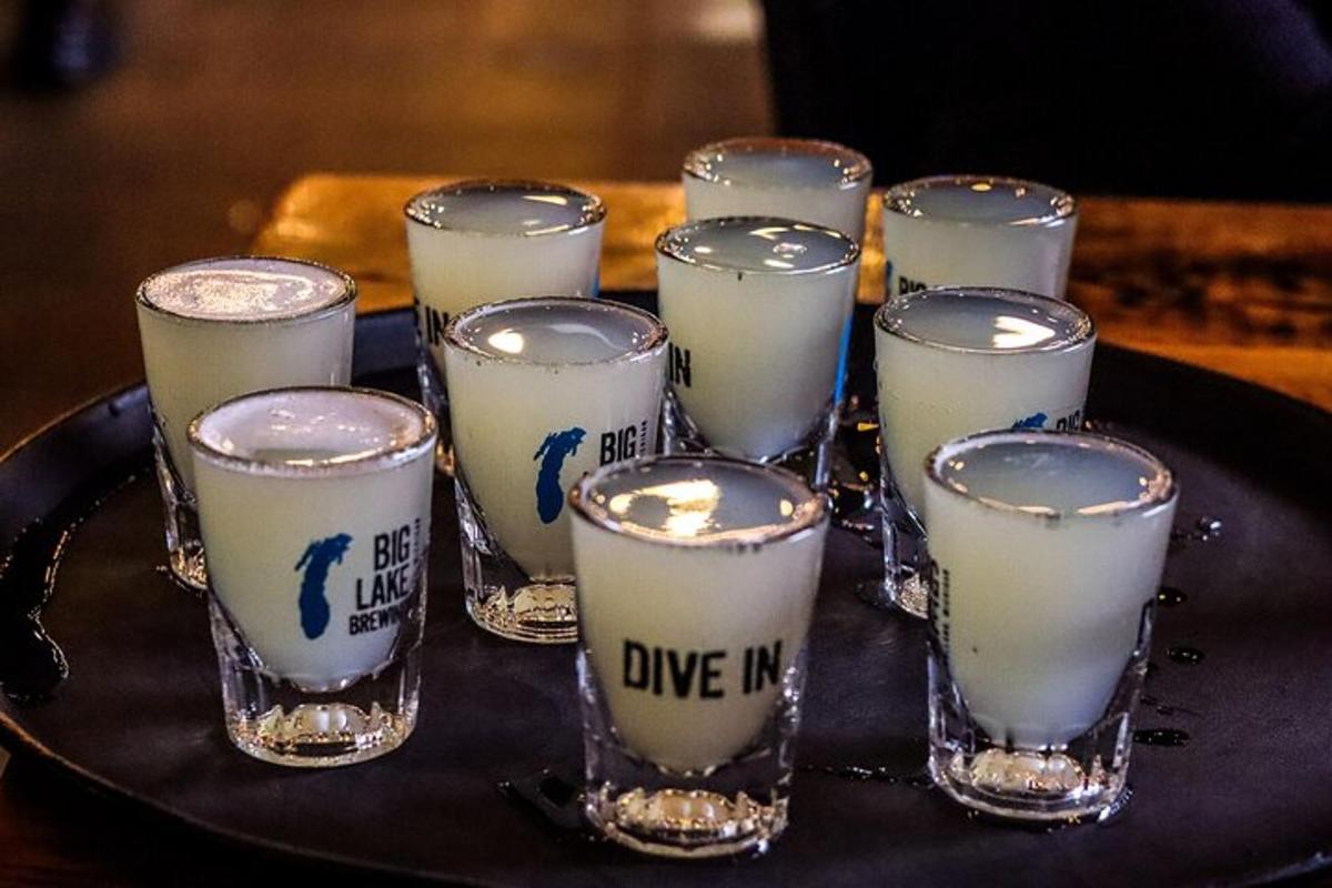a group of shot glasses sitting on a tray