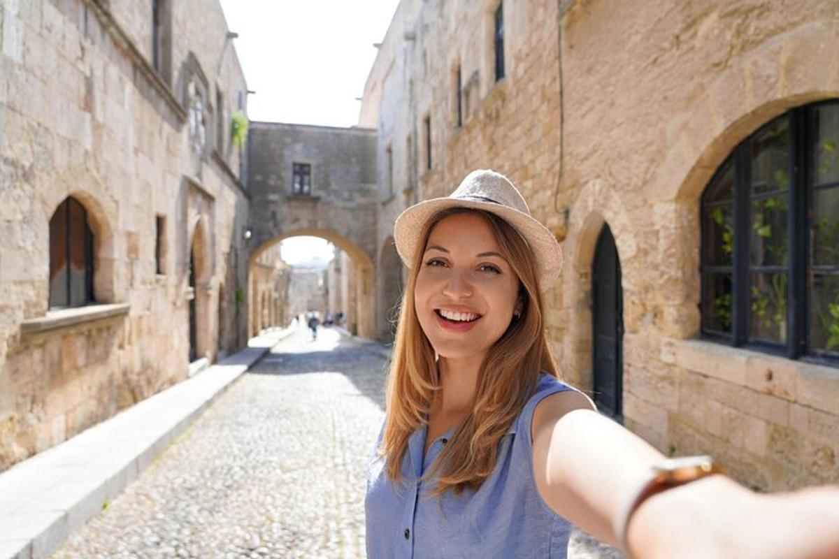 a woman in a hat standing in an alley