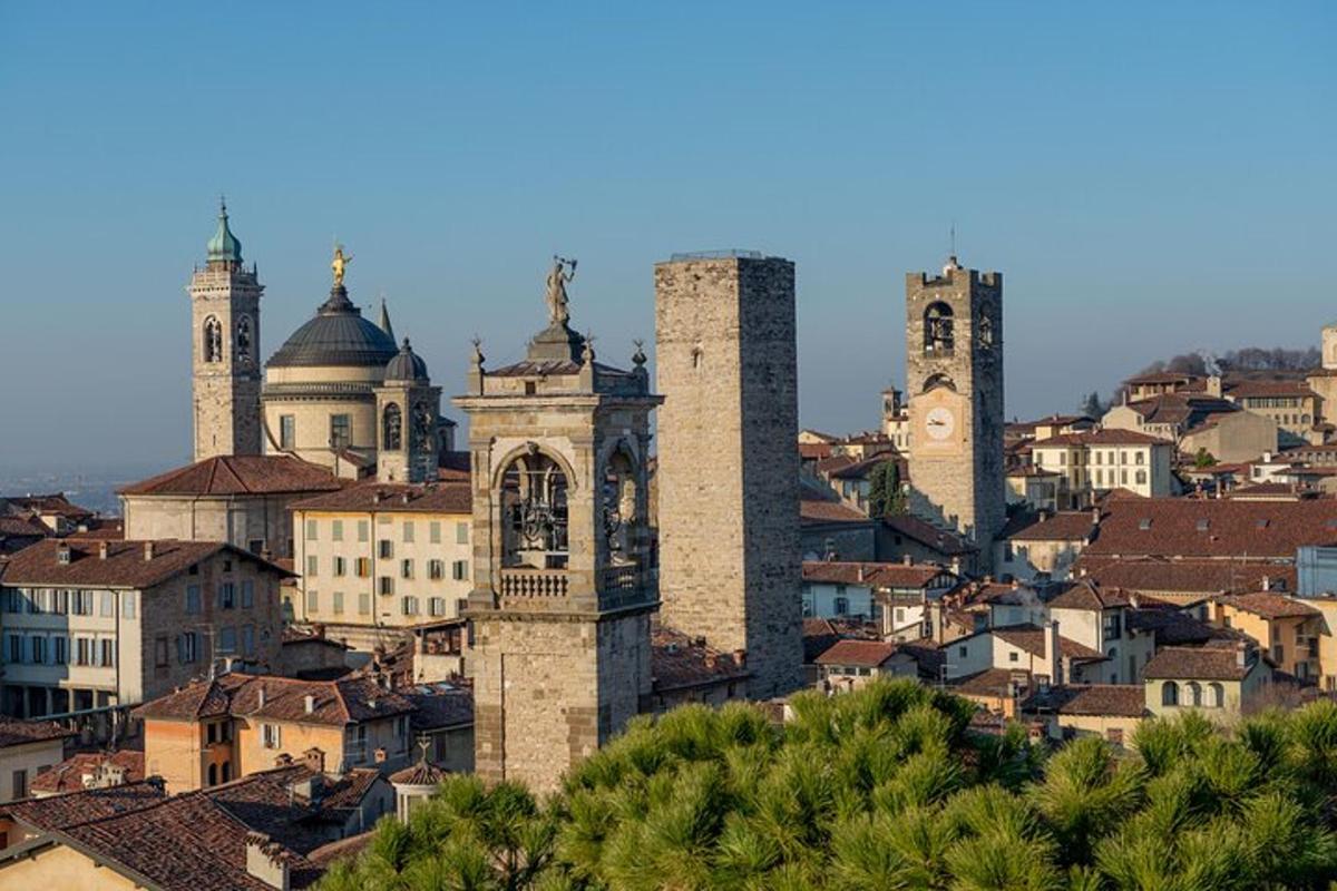 a view of a city with towers and buildings