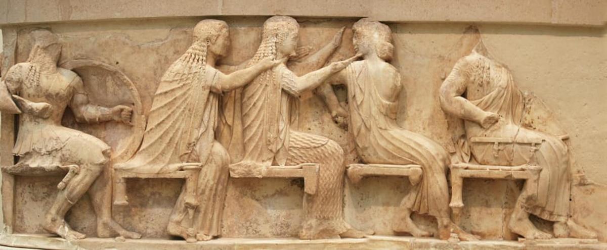 a stone relief on the side of a building