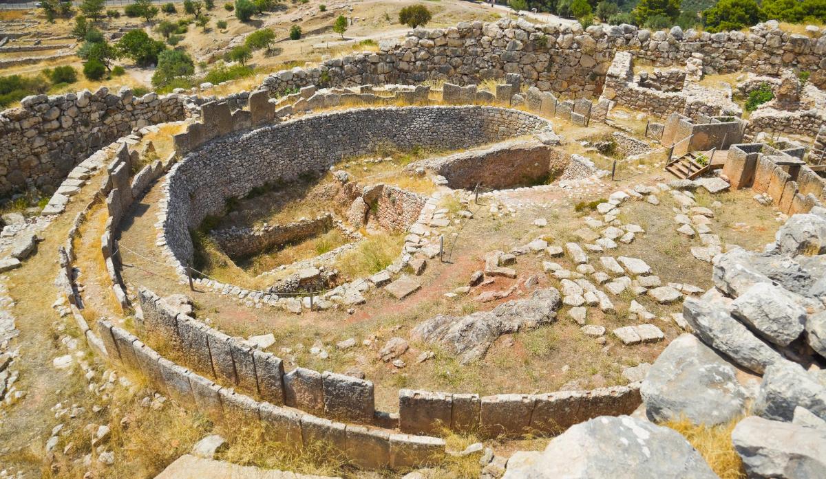 an ancient amphitheater on the side of a hill