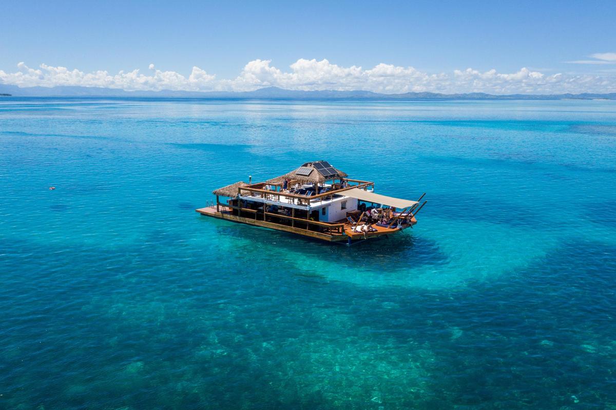 a boat in the middle of a large body of water