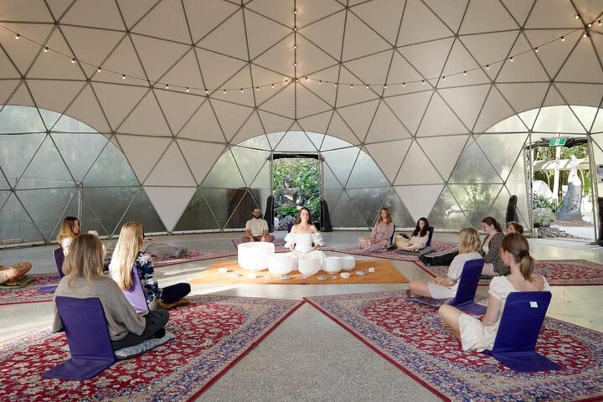 a group of people sitting on the floor in a room