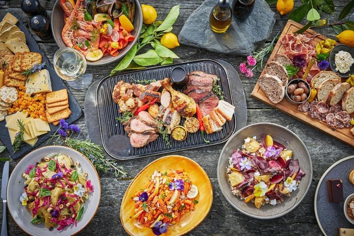 a table with many plates of food on it