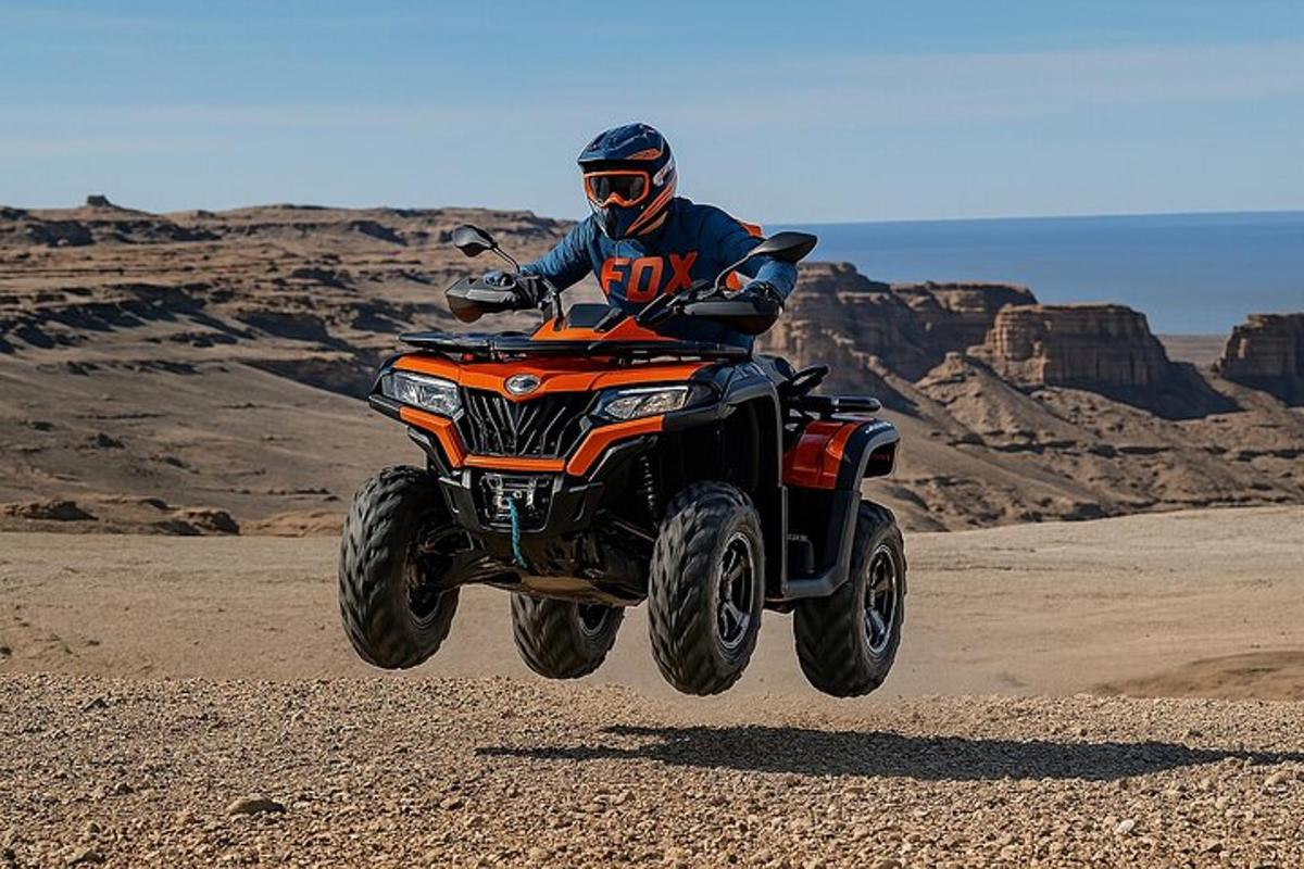 a person riding a dirt bike in the desert