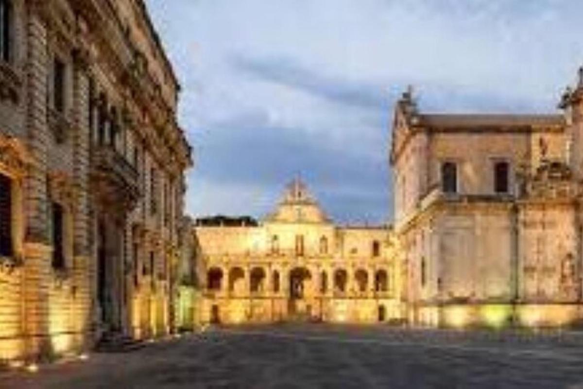 a large building with a street in front of it
