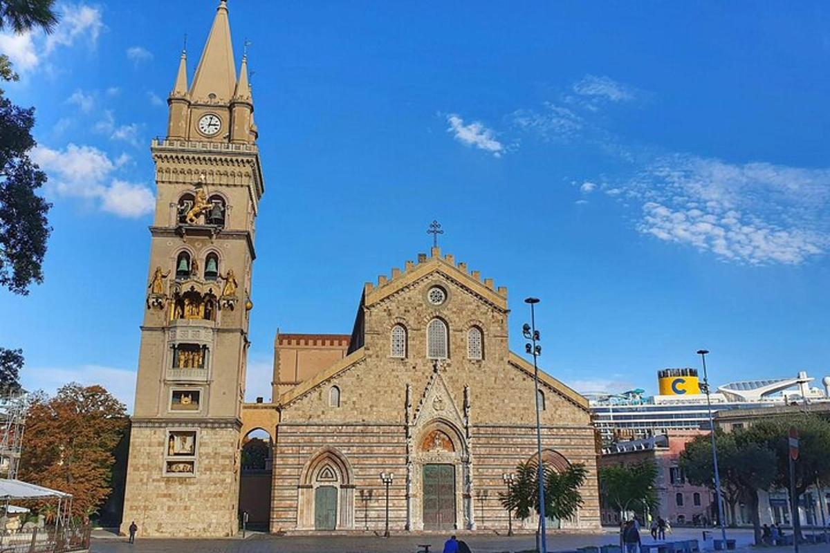 a church with a clock tower in front of it