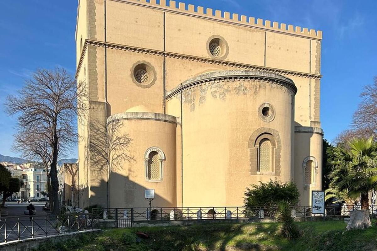 a large building with a tower on the side of it