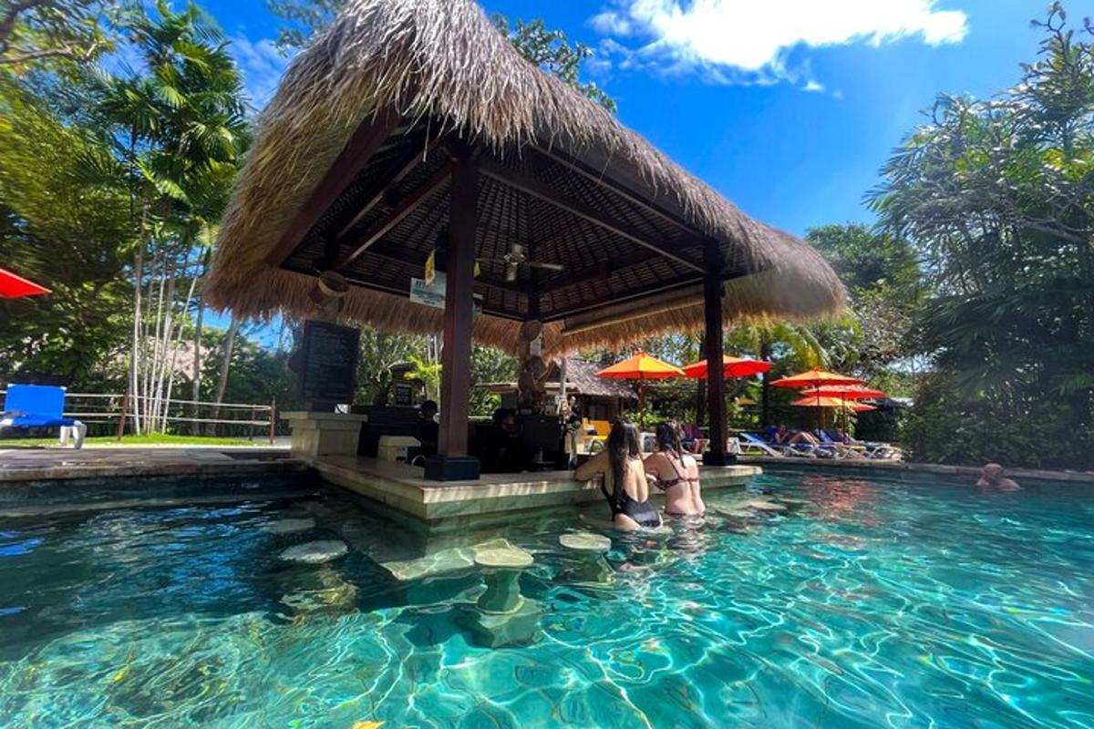 a swimming pool with a bar in the water