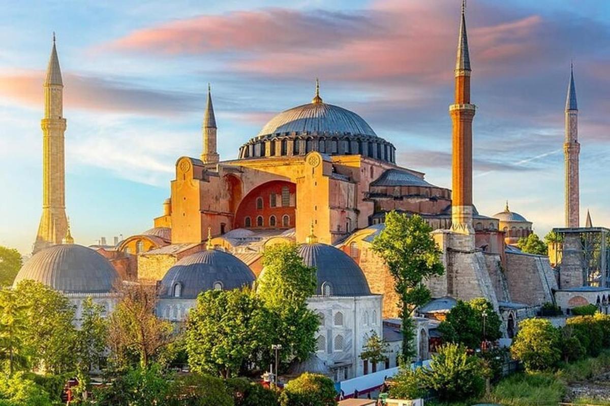 a building with domes and mosques in a city