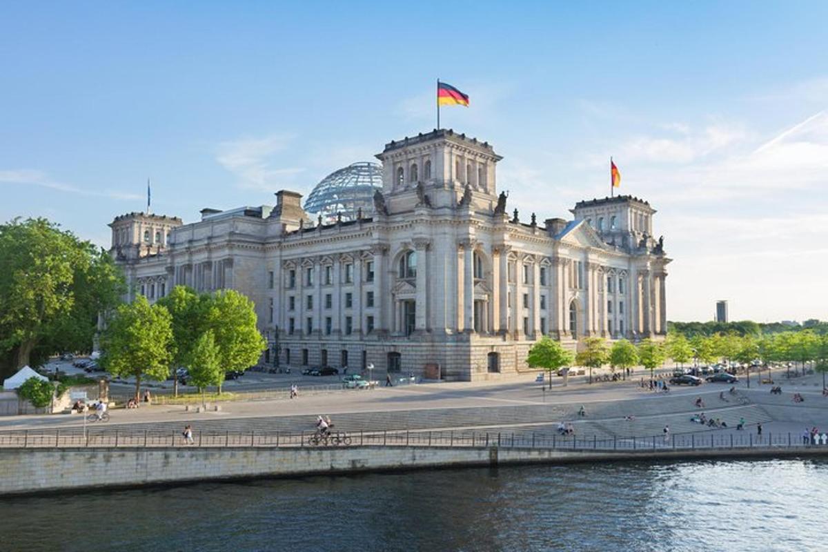 a large building next to a body of water